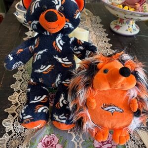 Denver Broncos teddy bear and possum.